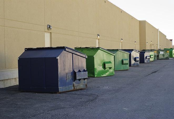 a row of industrial dumpsters at a construction site in Crestview Hills